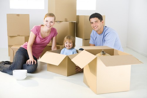 Removal team preparing a Knightsbridge flat move with packed boxes