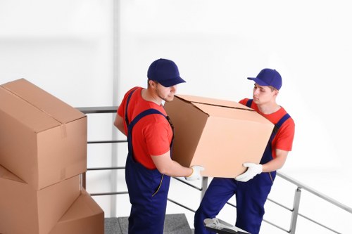 Removal team preparing items safely with protective materials
