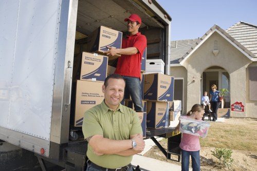 Professional movers loading household items for a Knightsbridge move