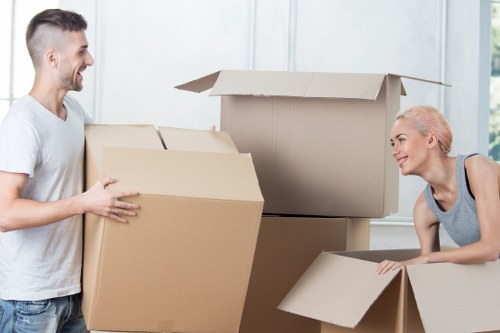Unpacking boxes in a central London apartment