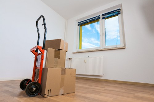 House removal van and movers working in Knightsbridge streets